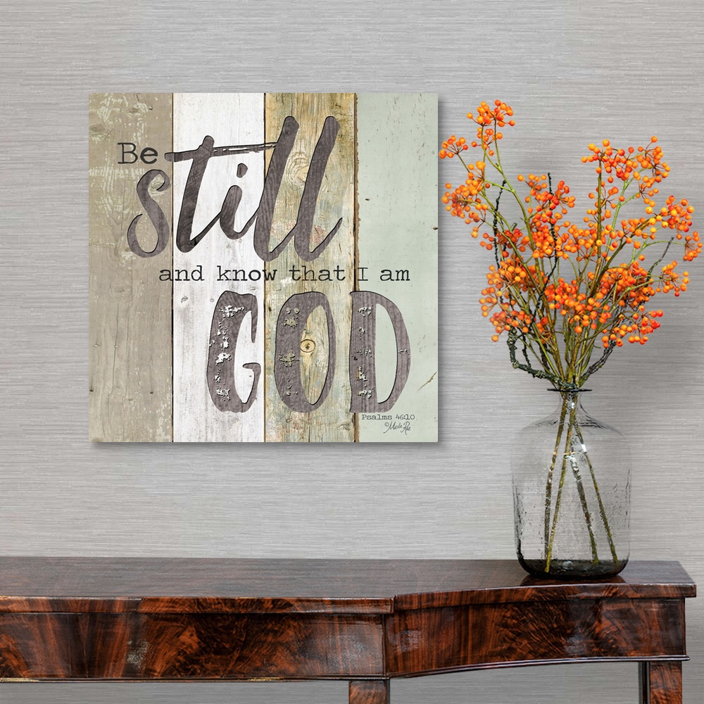 A traditional room featuring Bible verse Psalms 46:10 on a background of varied wooden boards.