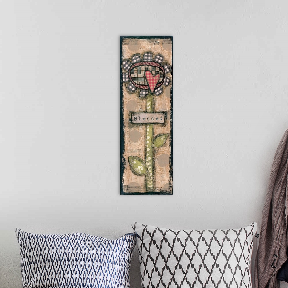 A bohemian room featuring Flower made from different patches of cloth against a weathered background.
