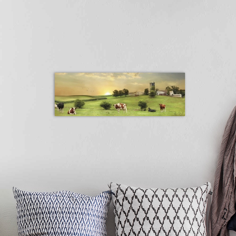 A bohemian room featuring Photograph of a farm landscape featuring cows and the sun rising in the background.