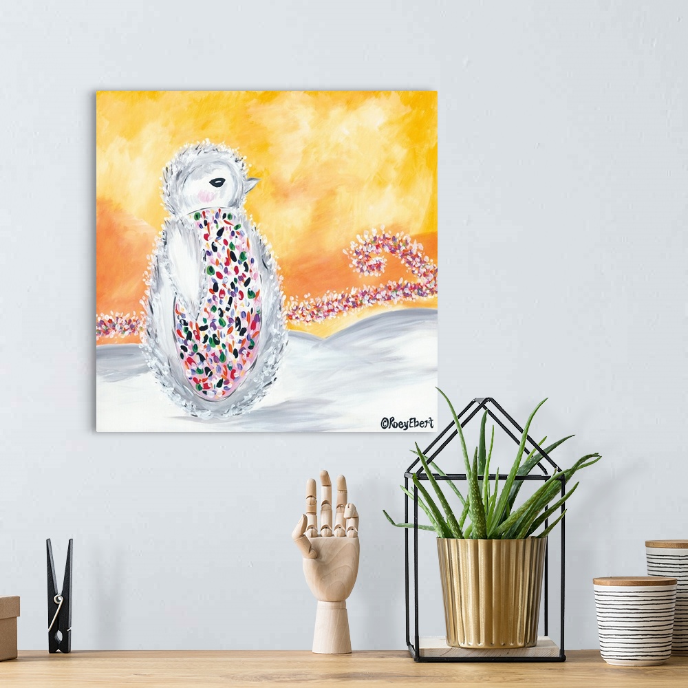 A bohemian room featuring Artwork of a baby penguin with a belly covered in multicolored dots.