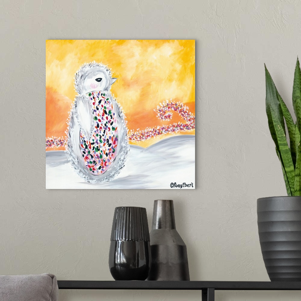 A modern room featuring Artwork of a baby penguin with a belly covered in multicolored dots.