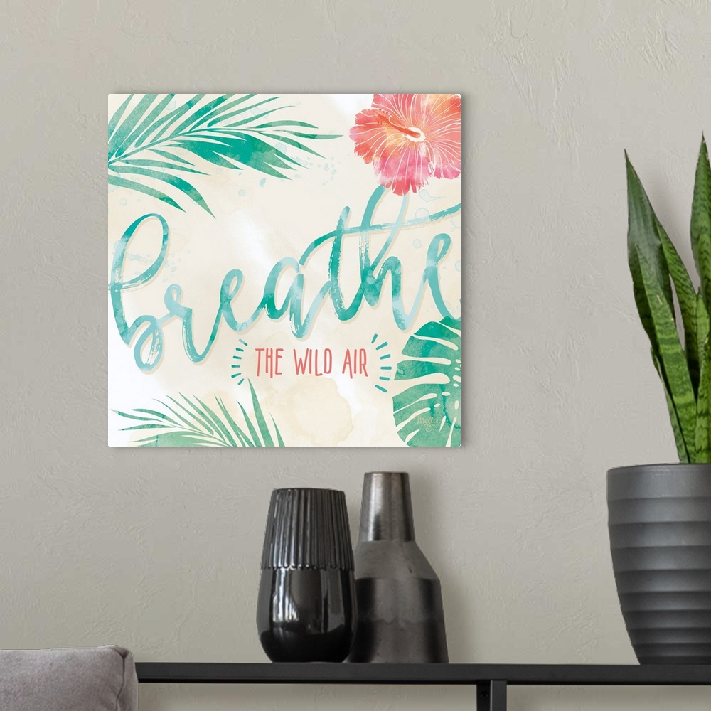 A modern room featuring Beach-themed artwork with "Breathe" in large script with a motif of tropical leaves and flowers.