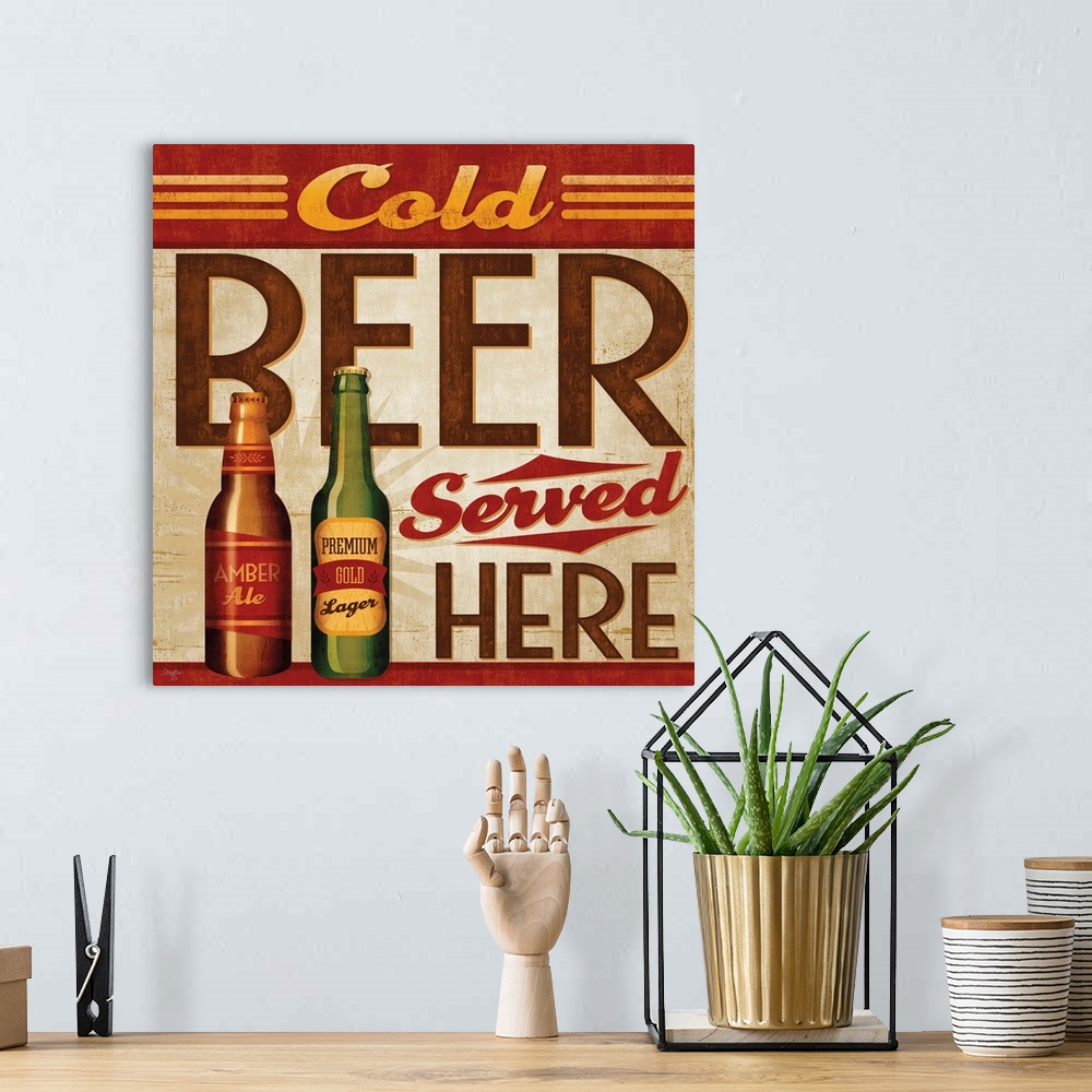 A bohemian room featuring Retro style sign advertising cold beer with large, bold lettering.
