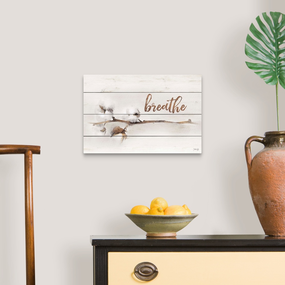 A traditional room featuring A stem with cotton buds and handlettered text over a wooden board background.