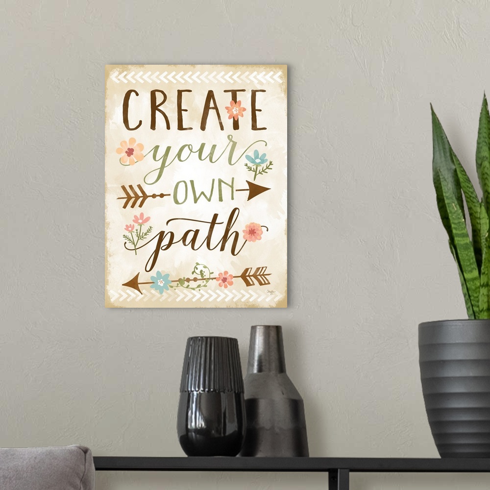A modern room featuring Handlettered inspirational sentiment embellished with a tribal arrow and flower motif.