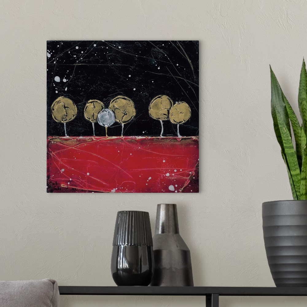 A modern room featuring Artwork of a glen of golden trees on a horizon over a red field at night.