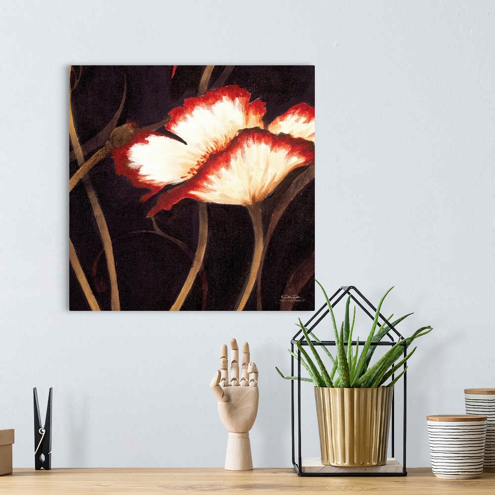 A bohemian room featuring Artwork of a red and white poppy with the stems in the background.