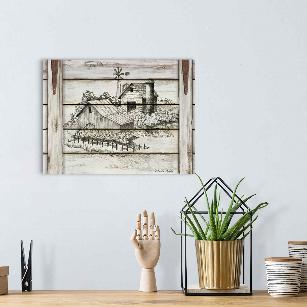 A bohemian room featuring Decorative artwork of sketched countryside scene over distressed planks of wood.