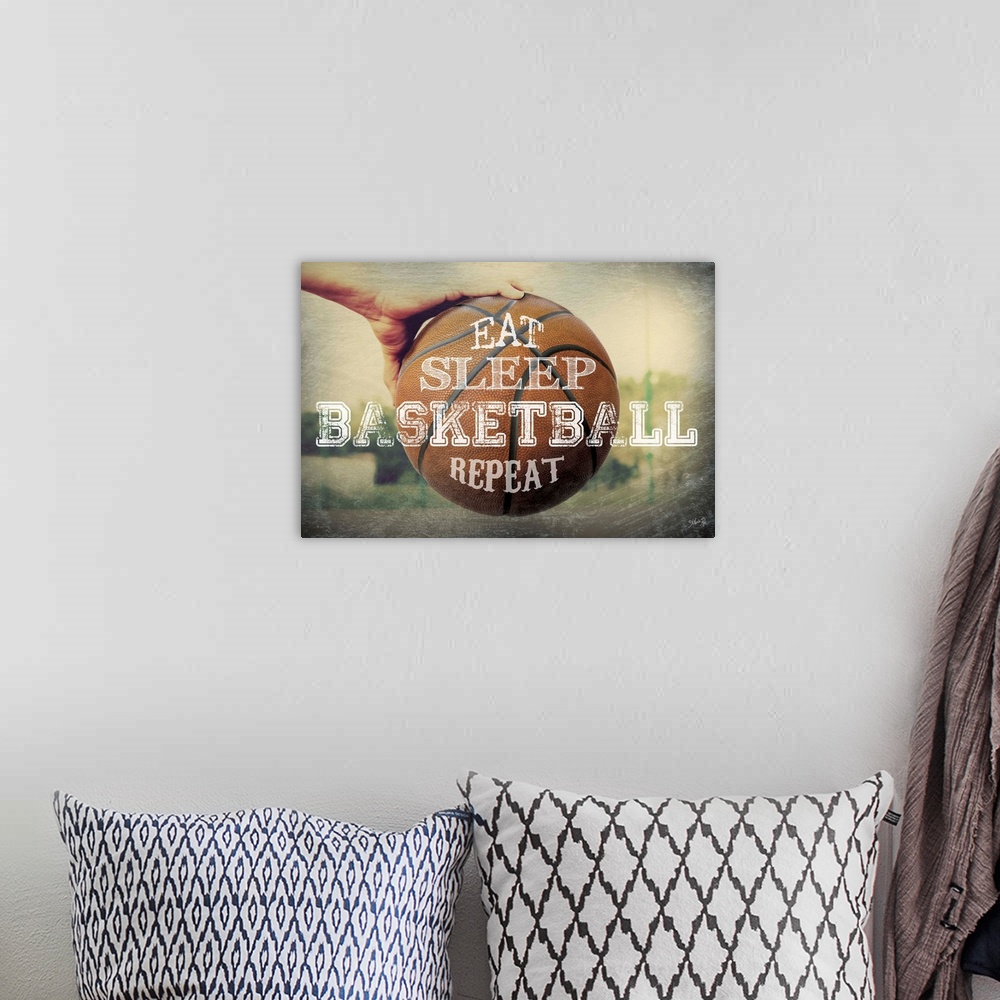 A bohemian room featuring A basketball typography design with a hand holding a ball.