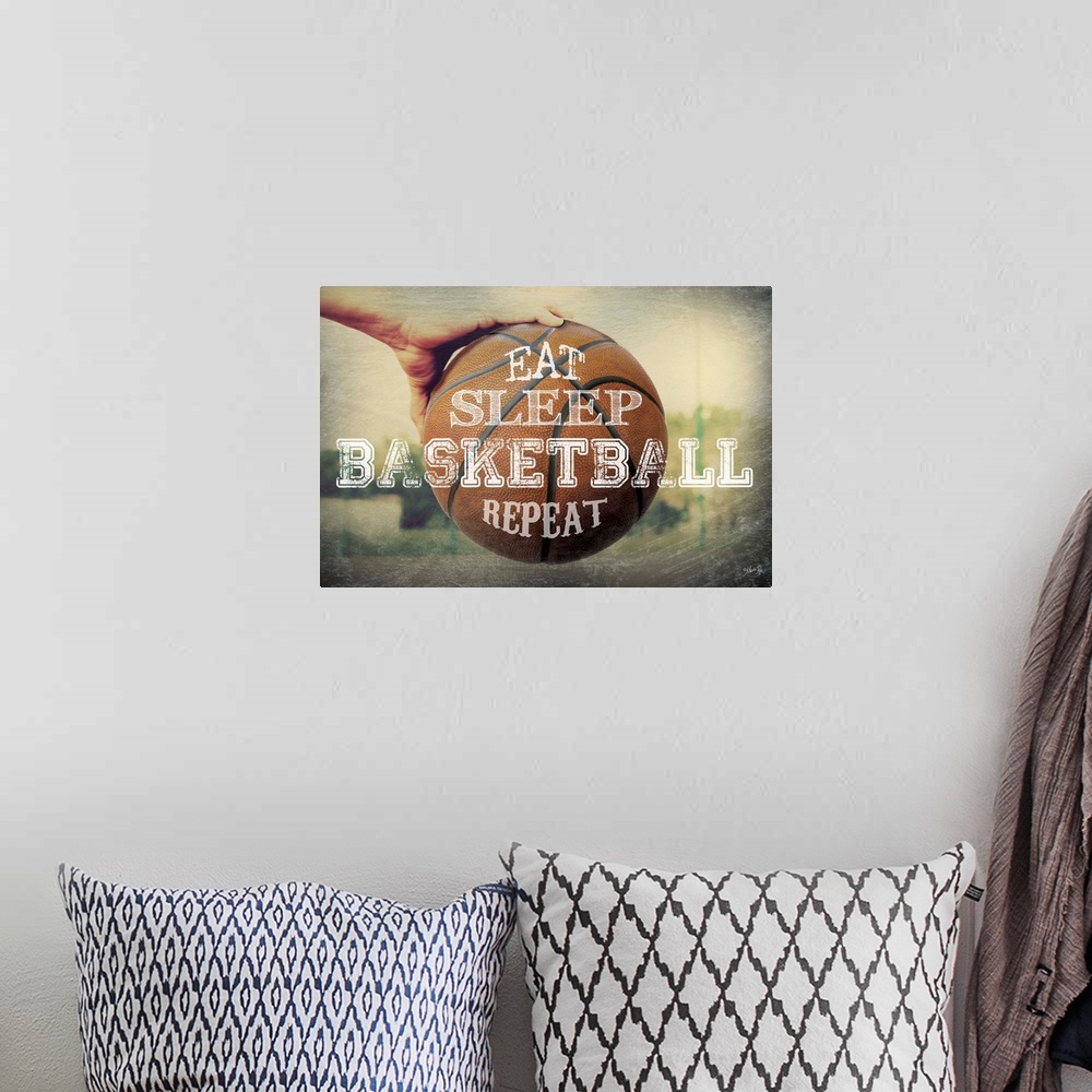 A bohemian room featuring A basketball typography design with a hand holding a ball.