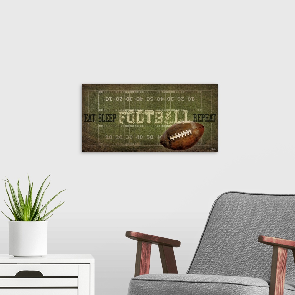A modern room featuring A football typography design with the field with yardlines and a ball.
