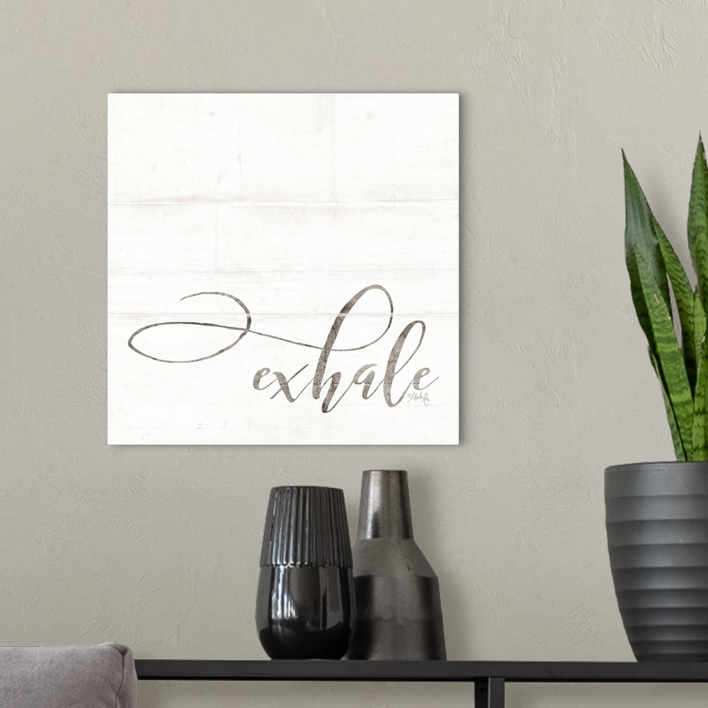 A modern room featuring Exhale