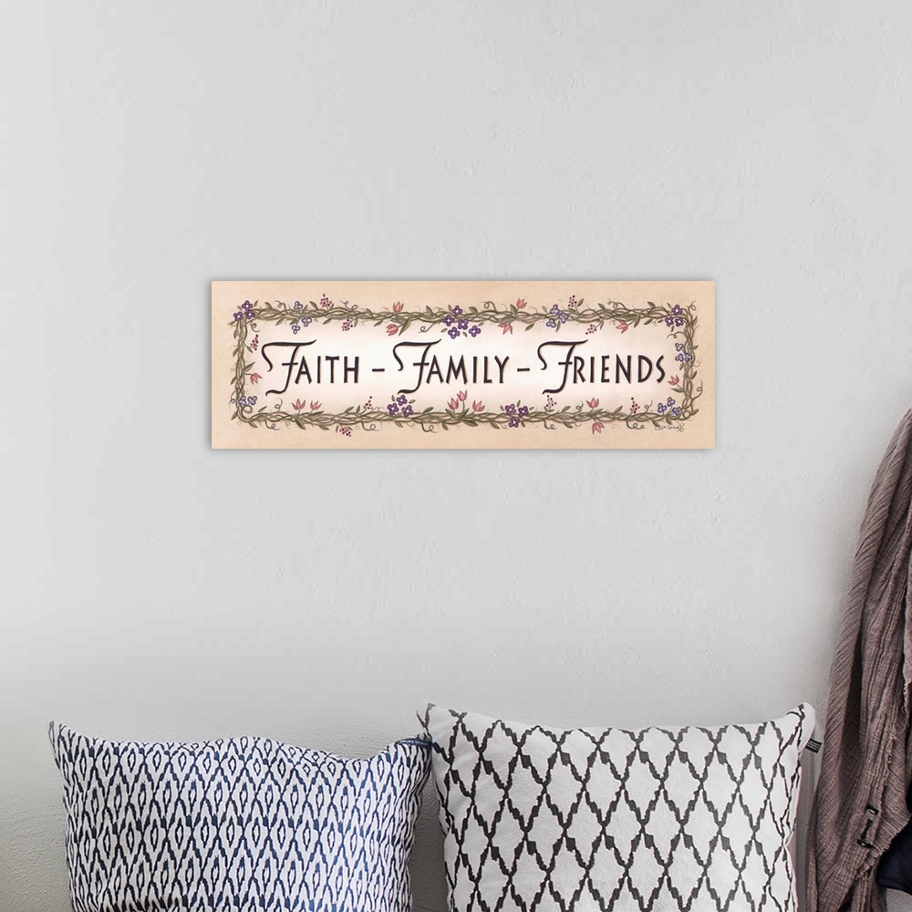 A bohemian room featuring Artwork of the words Faith, Family, and Friends framed by flowering vines.