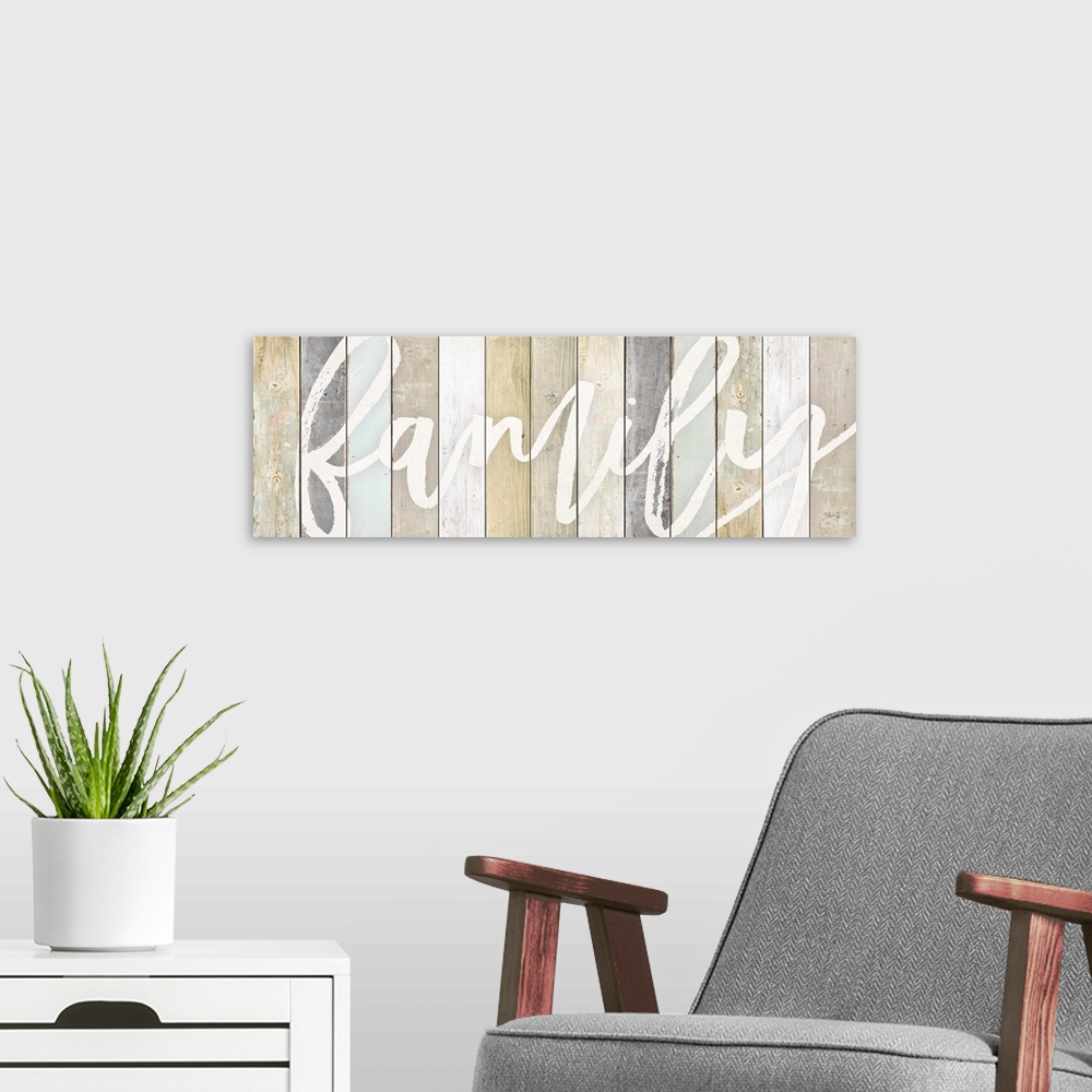 A modern room featuring Family-themed typography artwork on a background of various wooden boards.