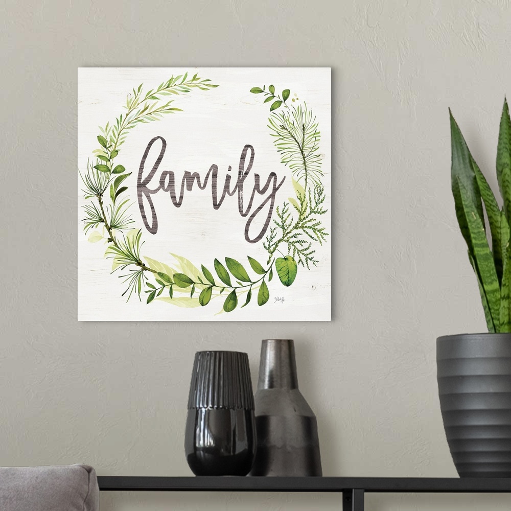 A modern room featuring Family Greenery Wreath