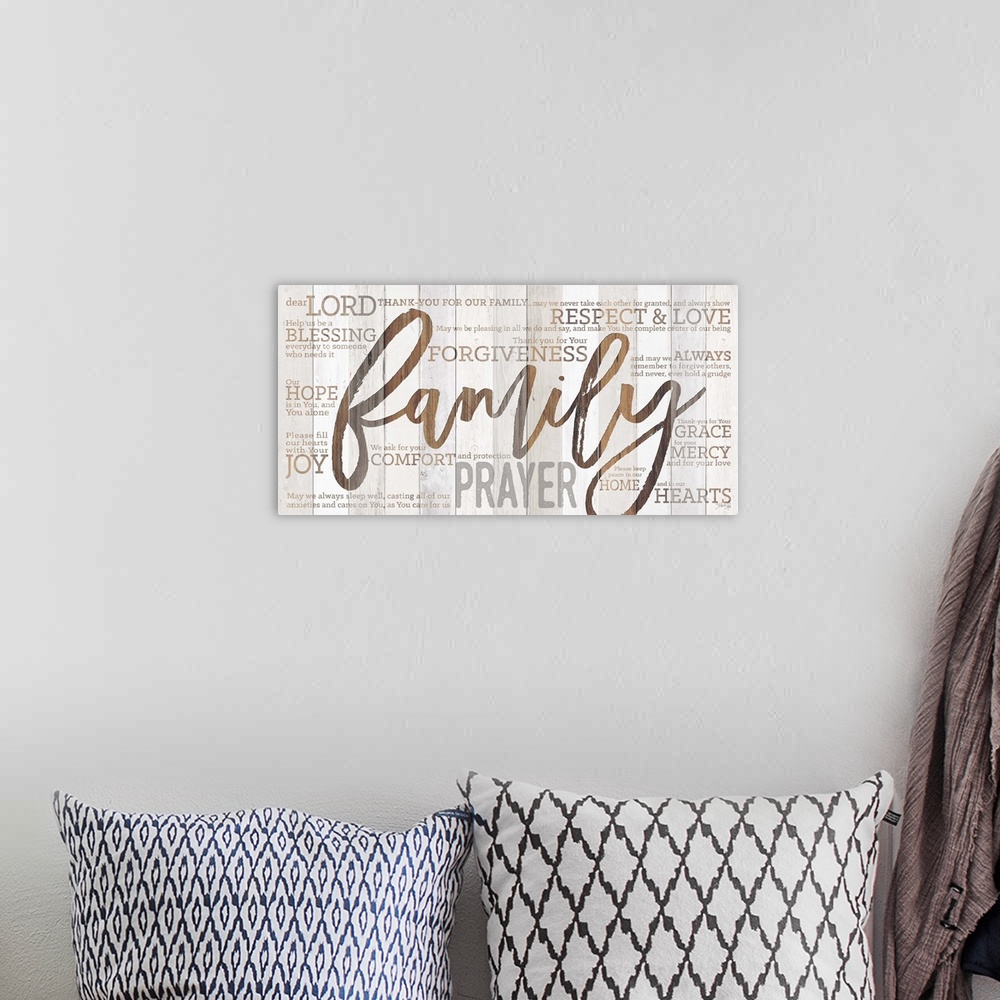 A bohemian room featuring Religious typography art with Christian-themed words surrounding Family Prayer in large text.