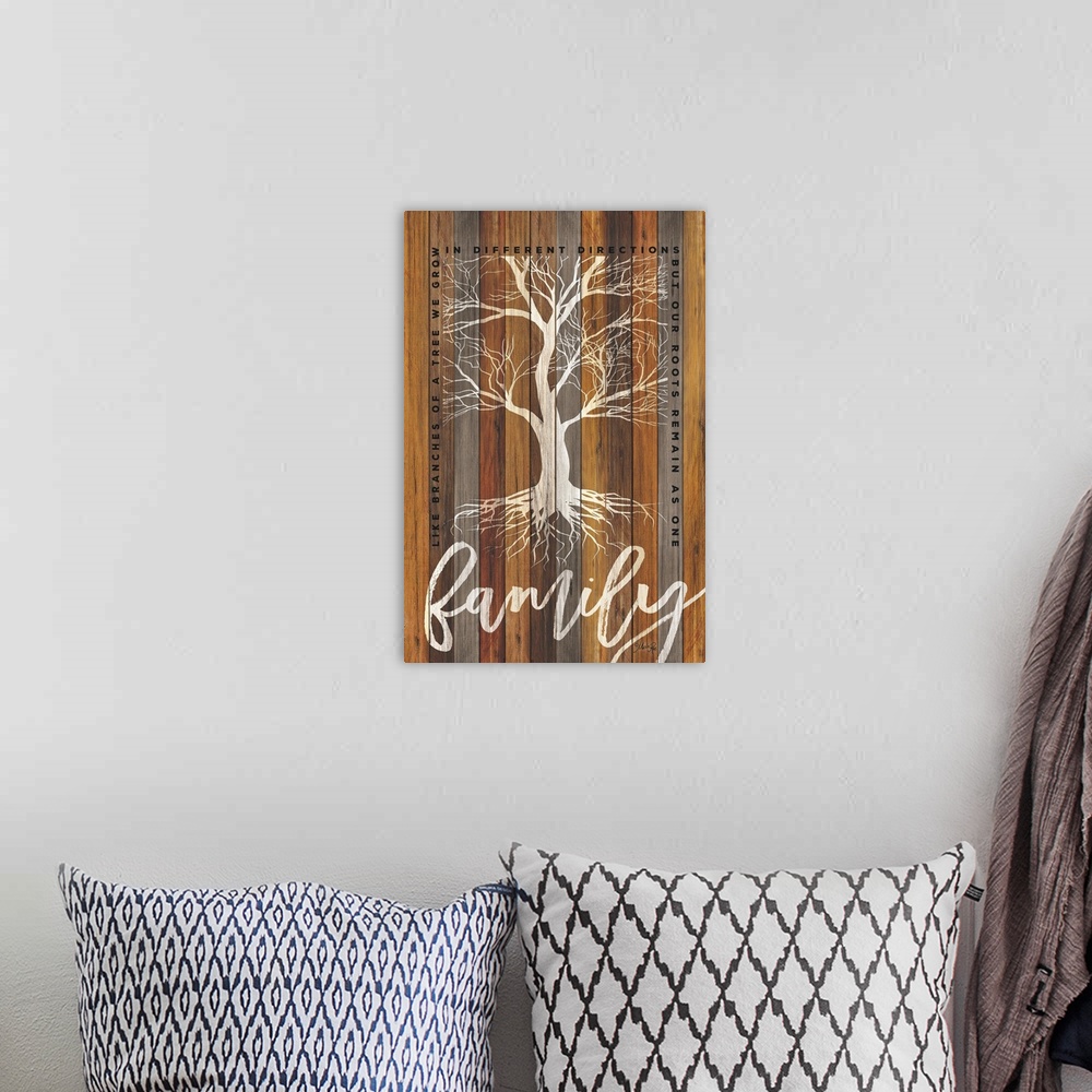 A bohemian room featuring Family-themed typography artwork with a tree design on a background of various wooden boards.