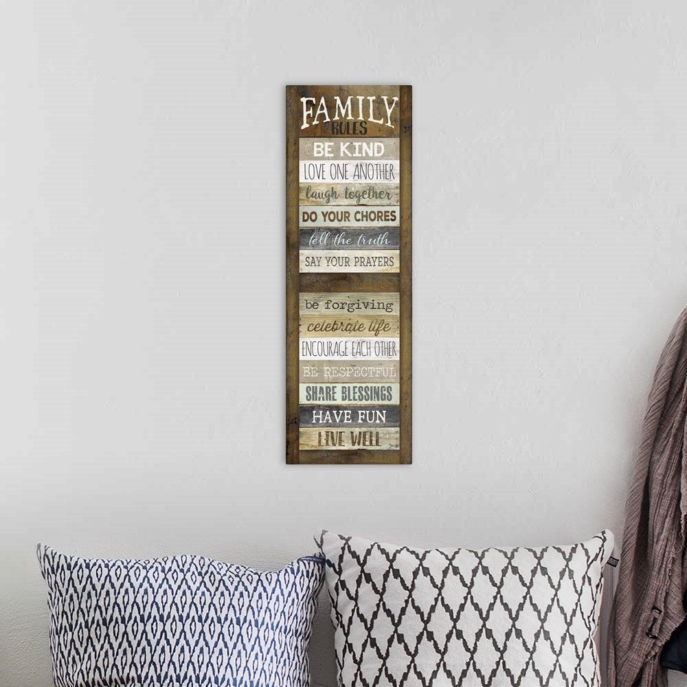 A bohemian room featuring Typography art of a list of family "Rules" such as doing chores and having fun, with the semblanc...