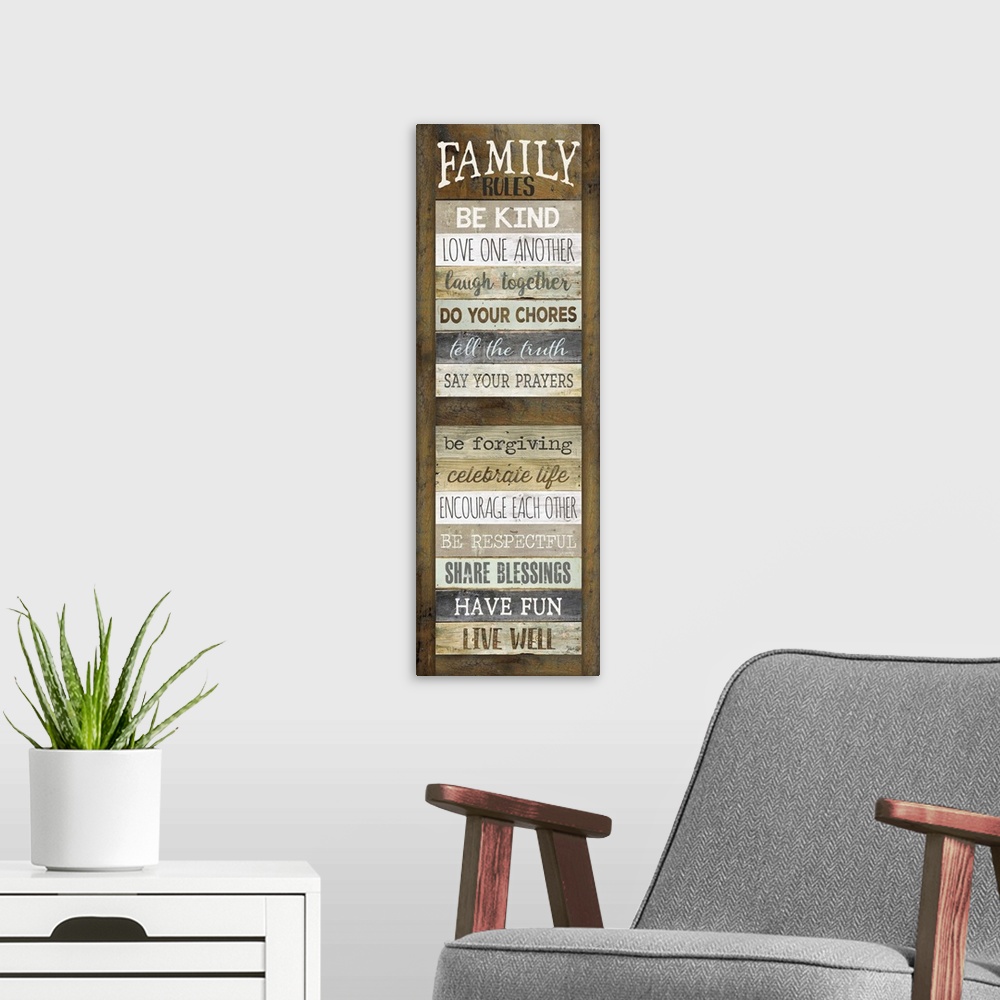 A modern room featuring Typography art of a list of family "Rules" such as doing chores and having fun, with the semblanc...