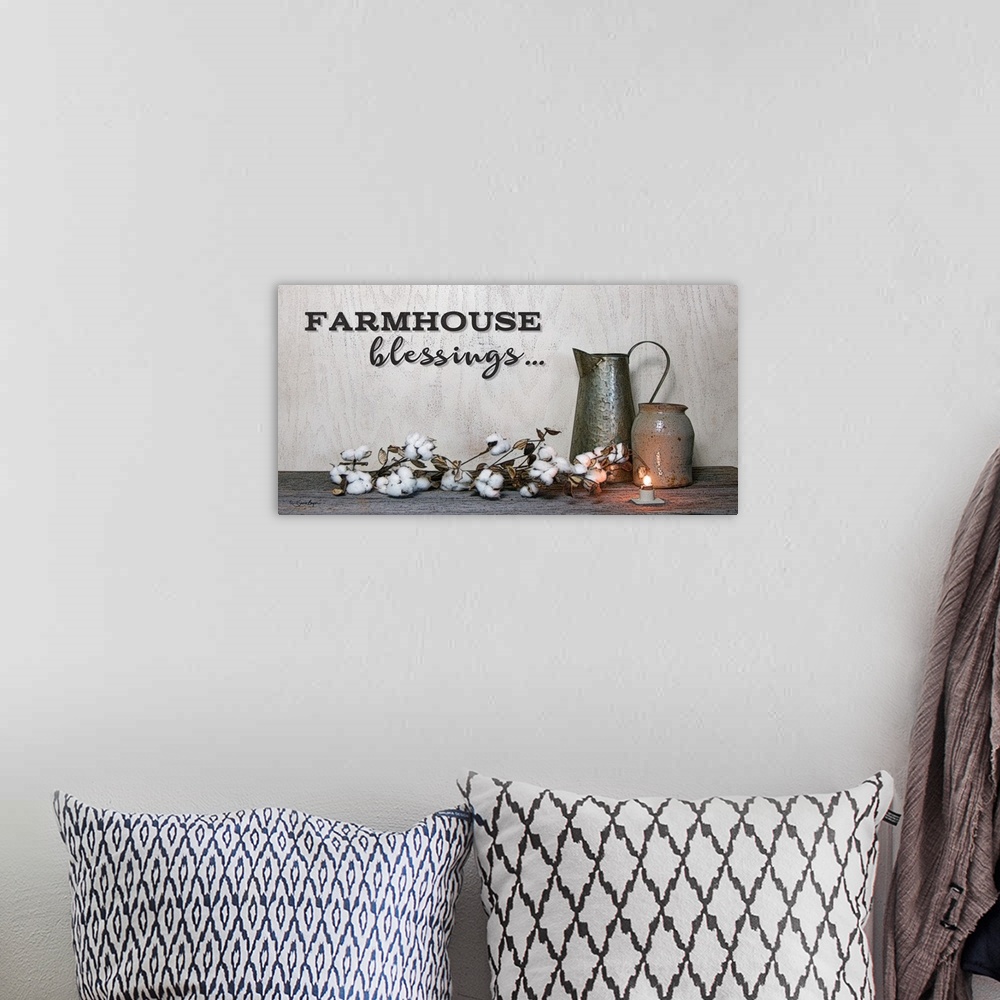 A bohemian room featuring This still-life photograph features rustic elements with the words, Farmhouse blessings, above it.
