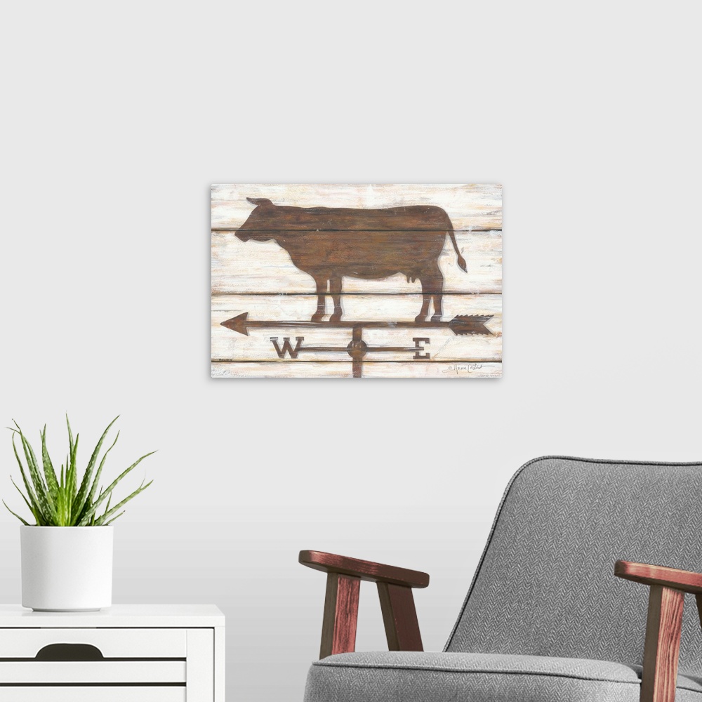 A modern room featuring Painted cow weather-vane on a tan background with a wooden board effect.