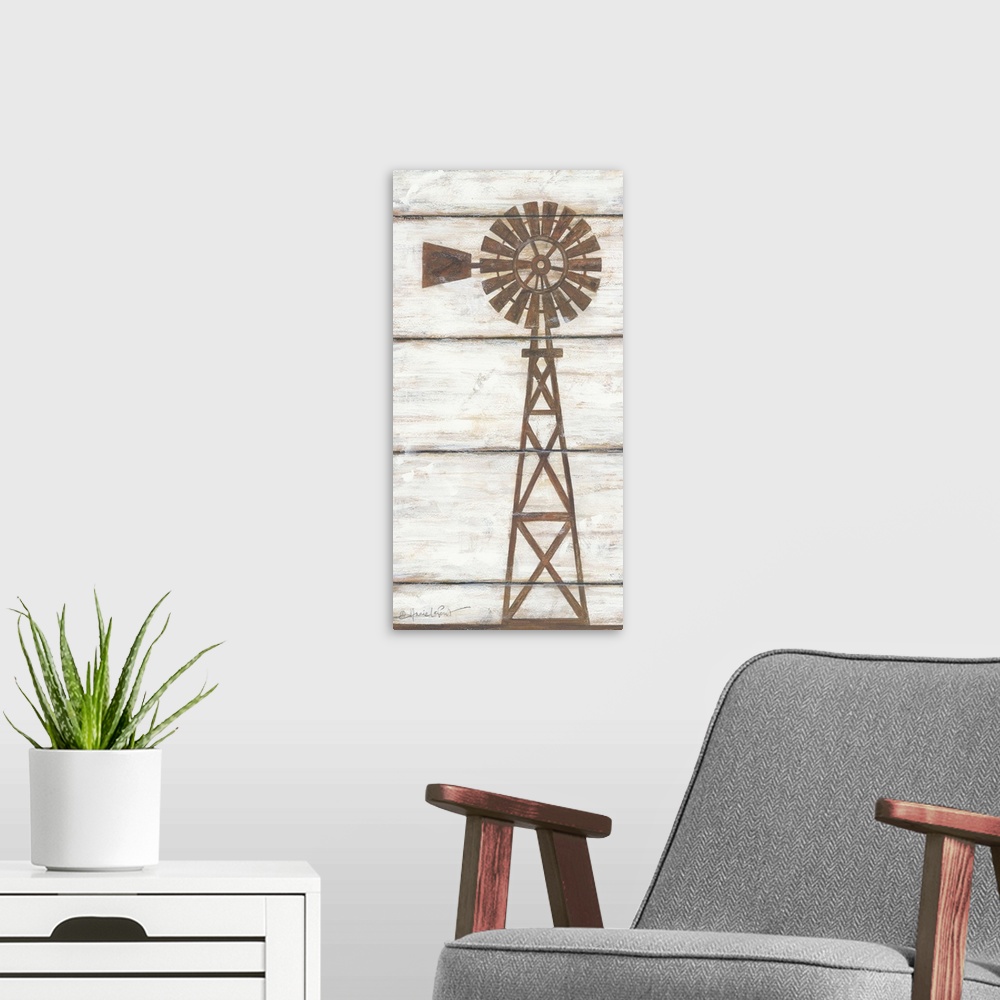 A modern room featuring Painting of a silhouetted windmill with the appearance of a wooden board background.