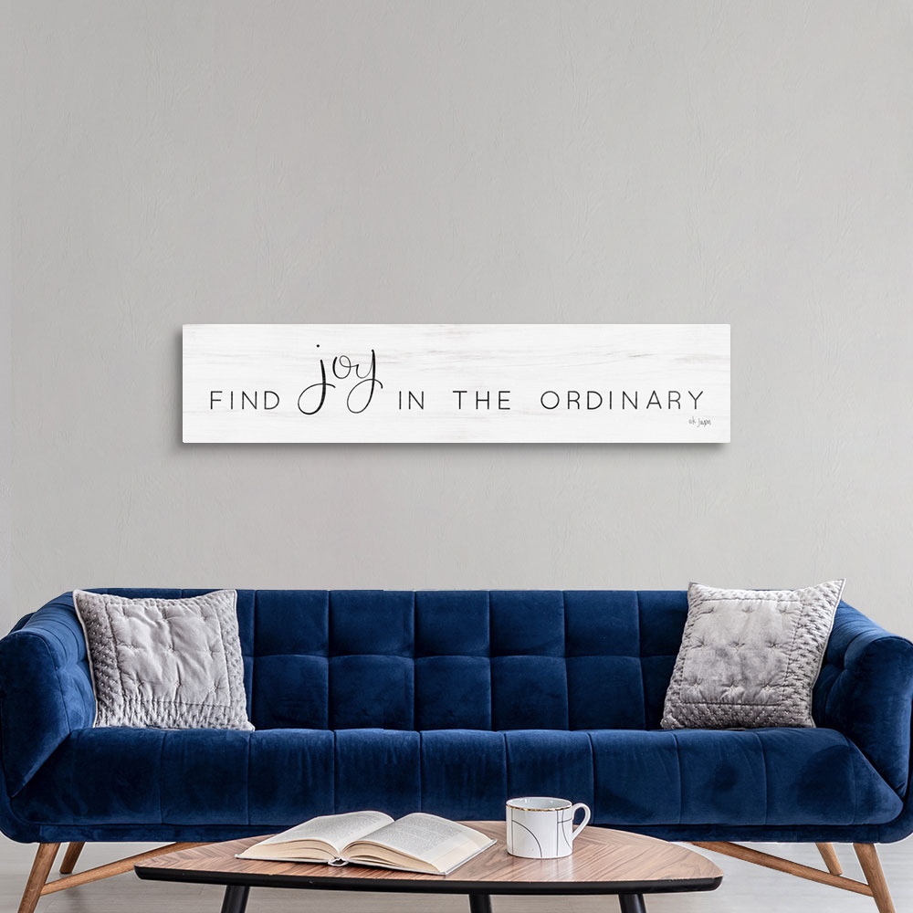A modern room featuring Find Joy in the Ordinary