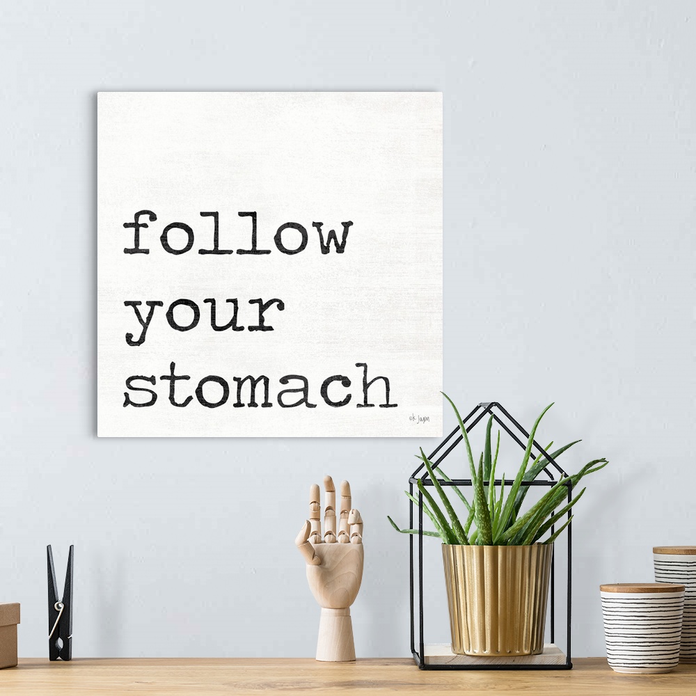 A bohemian room featuring Follow Your Stomach