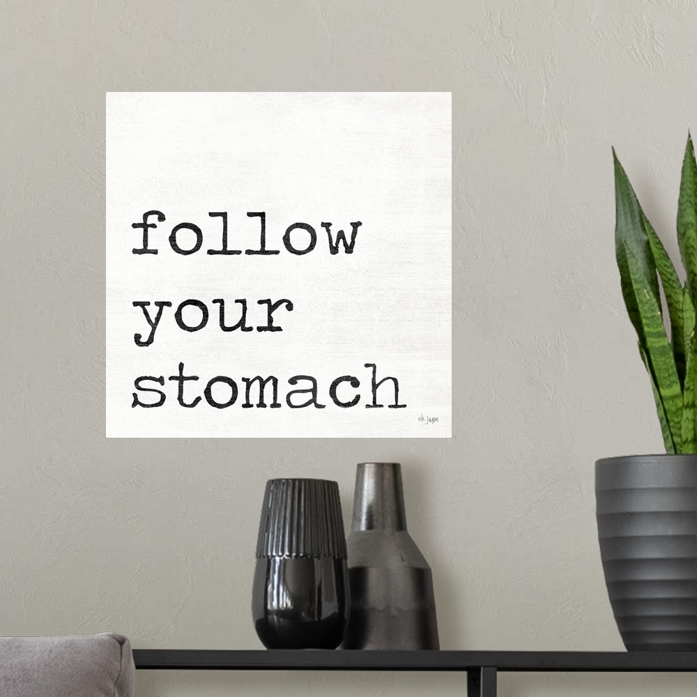 A modern room featuring Follow Your Stomach