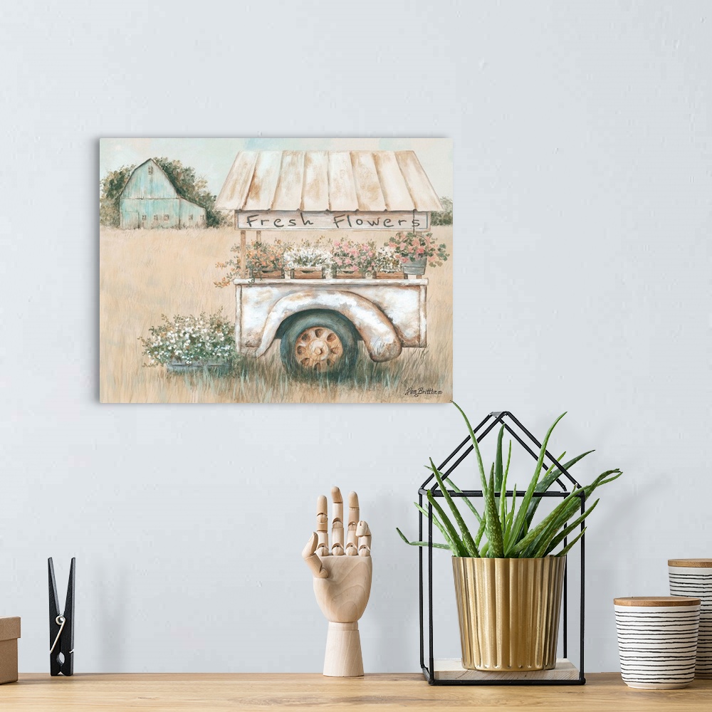 A bohemian room featuring Contemporary artwork of trailer wagon filled with flowers against a countryside landscape.