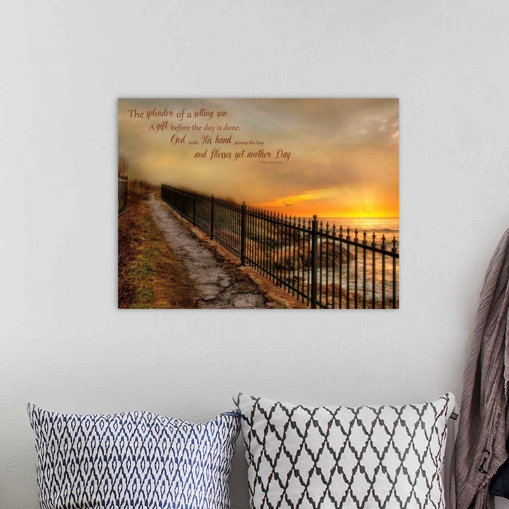 A bohemian room featuring A walkway with an iron fence along the coast, with a bible verse.