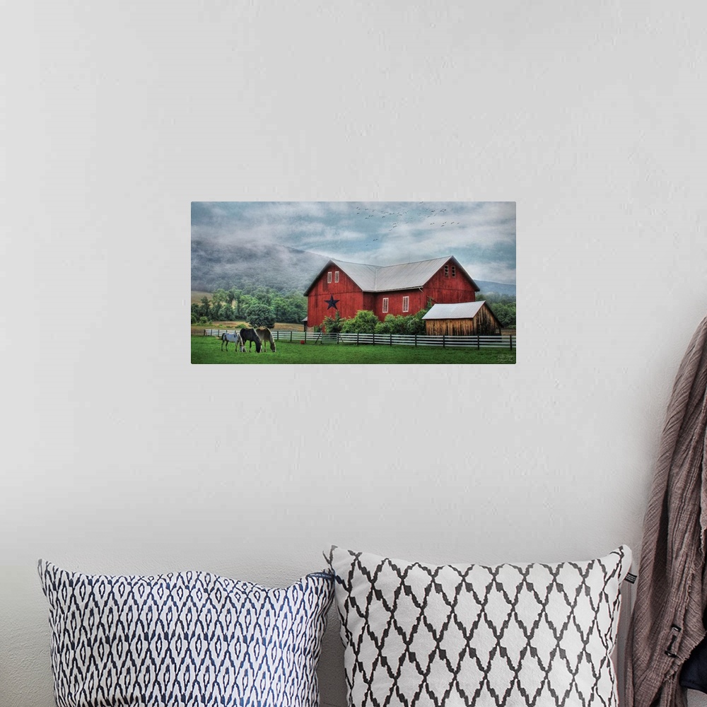A bohemian room featuring Photograph of a red barn in rural countryside scene.