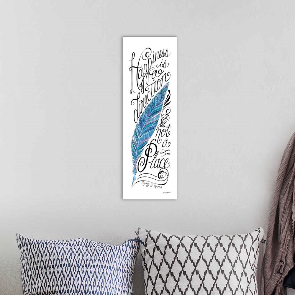 A bohemian room featuring Vertical handlettered artwork of an inspirational quote, with a blue feather design.