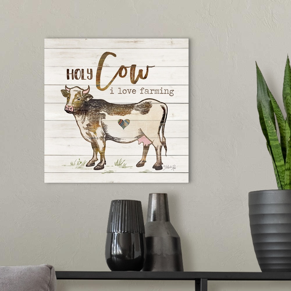 A modern room featuring Illustration of a cow with humorous text on a white board background.