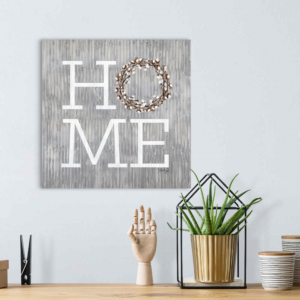 A bohemian room featuring "Home" with a wreath on a weathered metal background.
