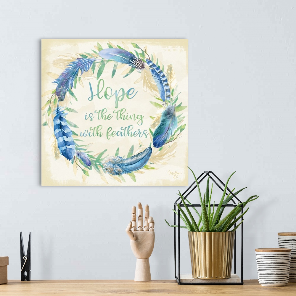 A bohemian room featuring Handlettered inspirational text in a watercolor wreath of blue feathers.
