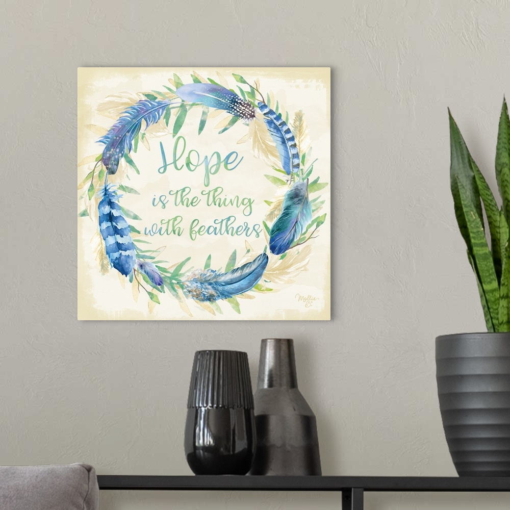 A modern room featuring Handlettered inspirational text in a watercolor wreath of blue feathers.