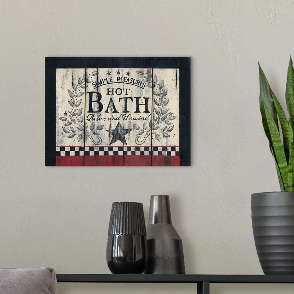 A modern room featuring Decorative artwork featuring the words: Simple pleasures, hot bath, relax and unwind, in a rustic...