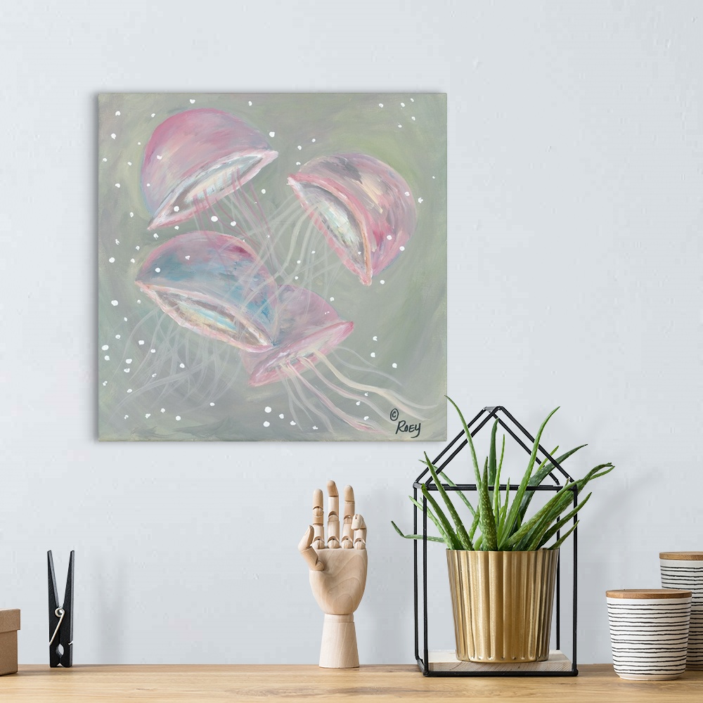 A bohemian room featuring Square abstract painting of four pink jellyfish.