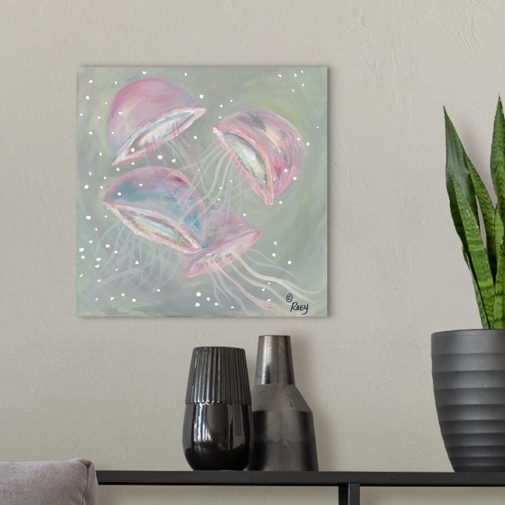 A modern room featuring Square abstract painting of four pink jellyfish.