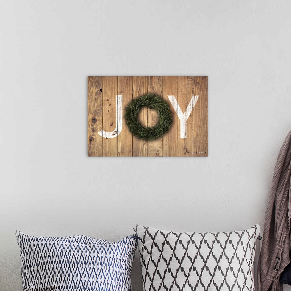 A bohemian room featuring Joy Cedar Wreath
