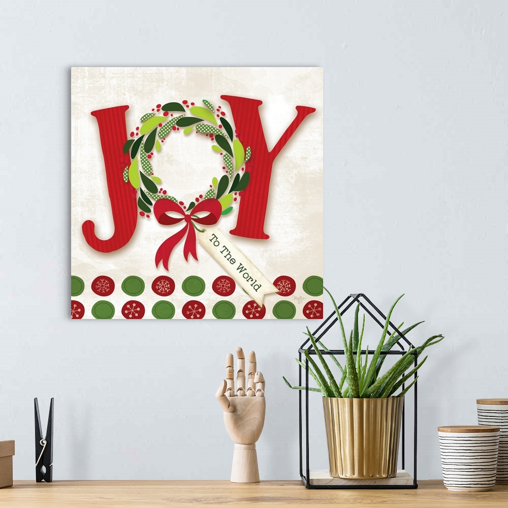 A bohemian room featuring This decorative artwork features the holiday sentiment: Joy to the world, in vibrant reds and gre...