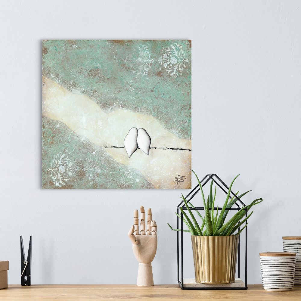 A bohemian room featuring Contemporary artwork of two white birds nestled together on a branch.