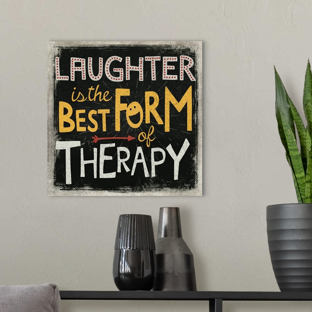 A modern room featuring Typography art of a loving sentiment in a fun and bold text.