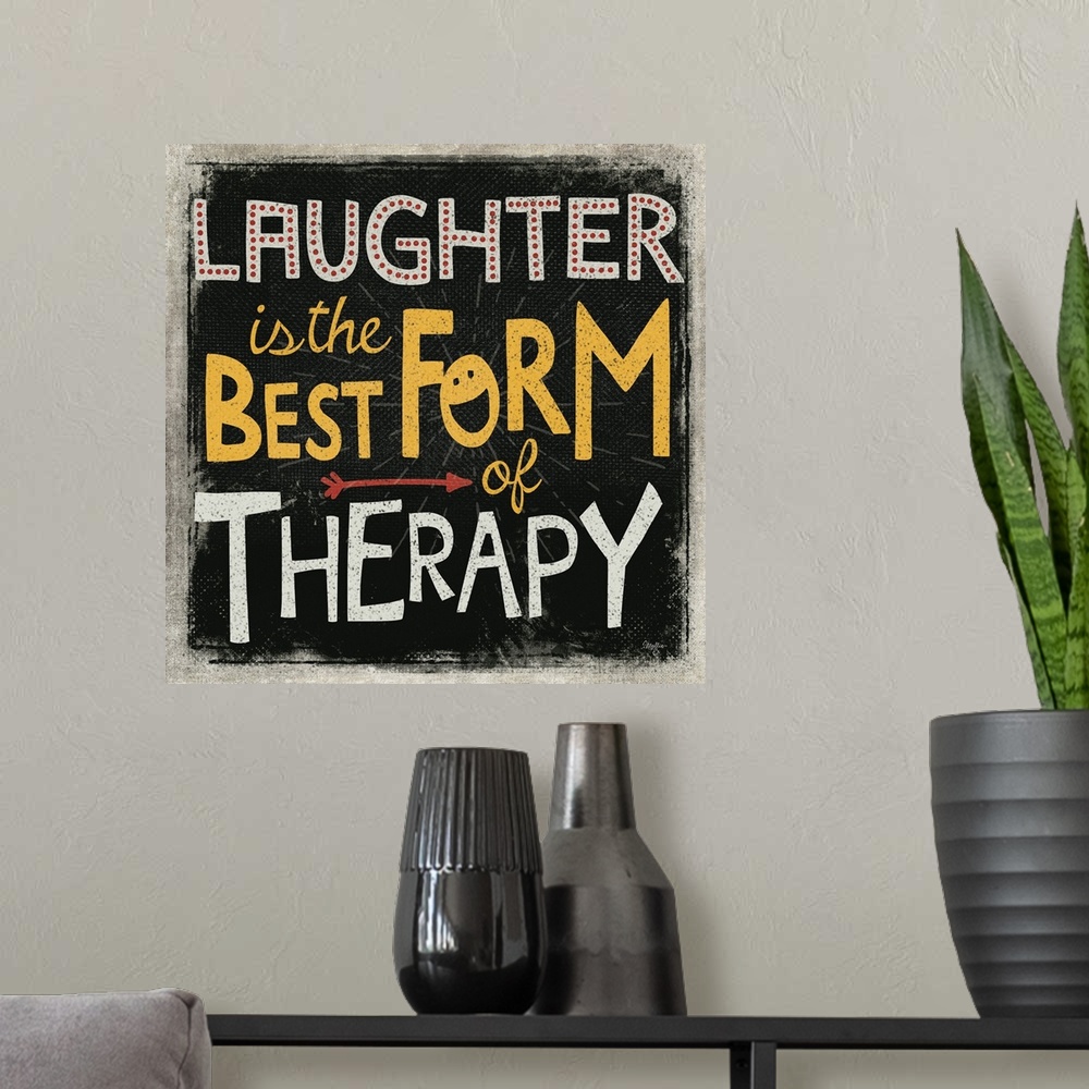 A modern room featuring Typography art of a loving sentiment in a fun and bold text.