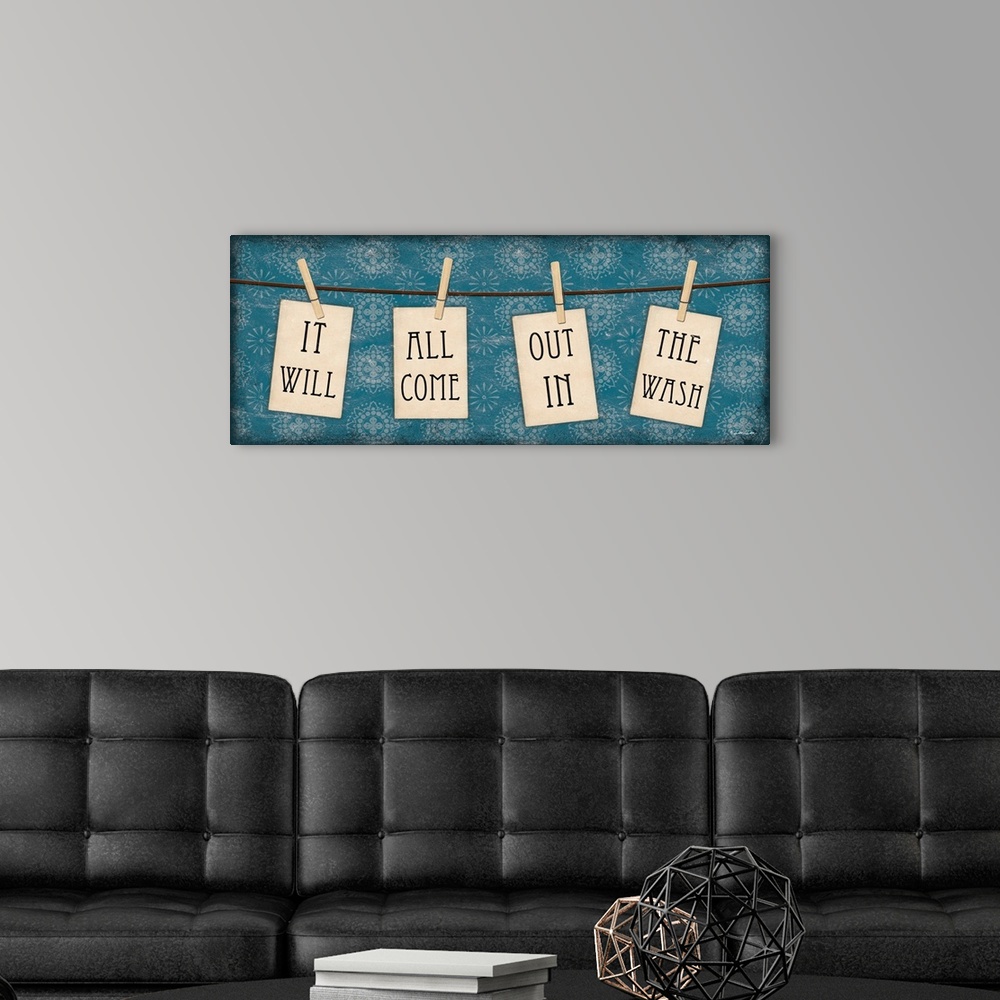 A modern room featuring Charming laundry room art of clothespins on a line with the text "It will all come out in the wash."