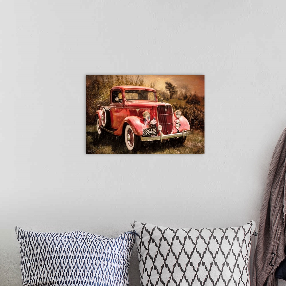 A bohemian room featuring Vintage red truck sitting in a field in the country.