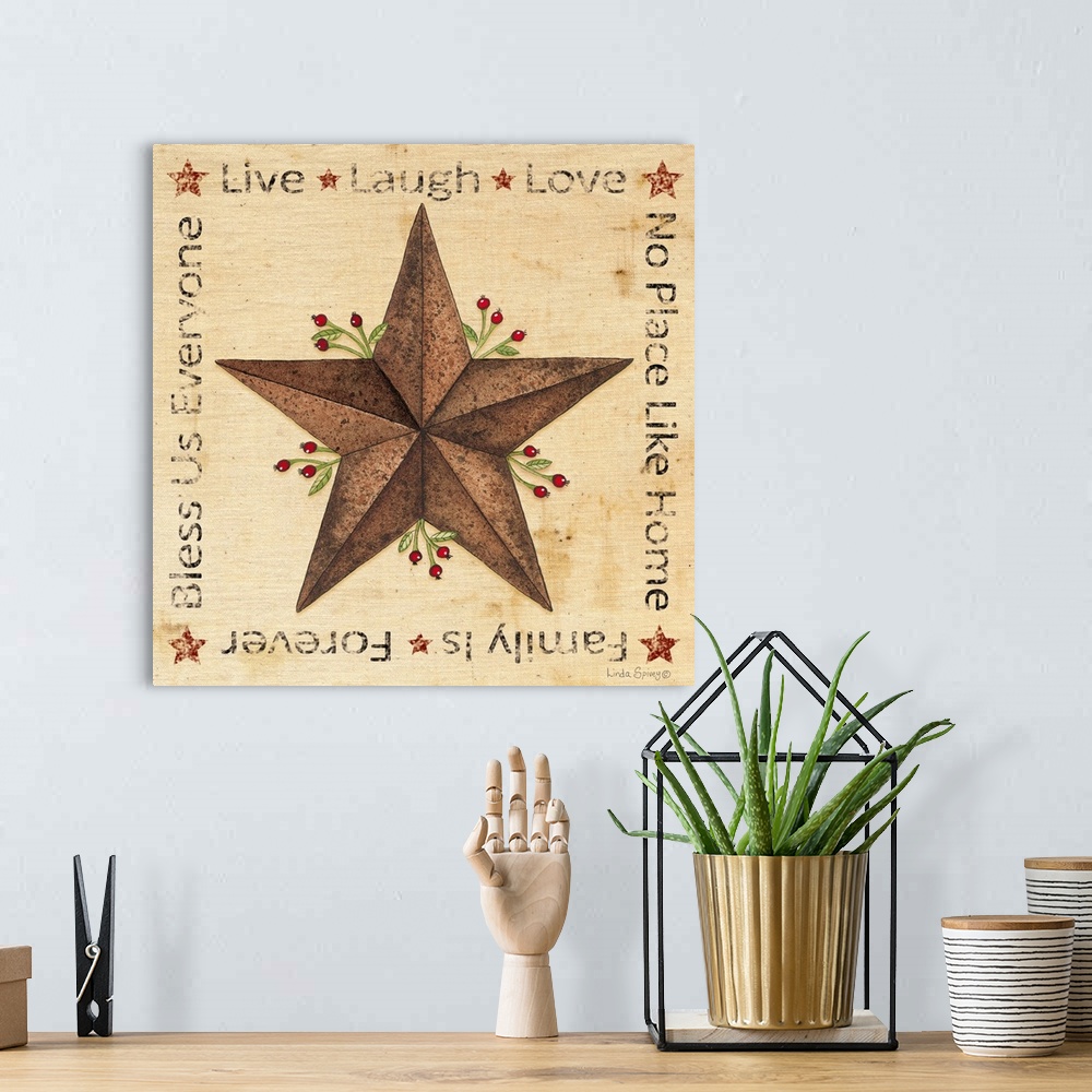 A bohemian room featuring Folk style artwork of a metal barn star, framed with family and home-themed phrases.