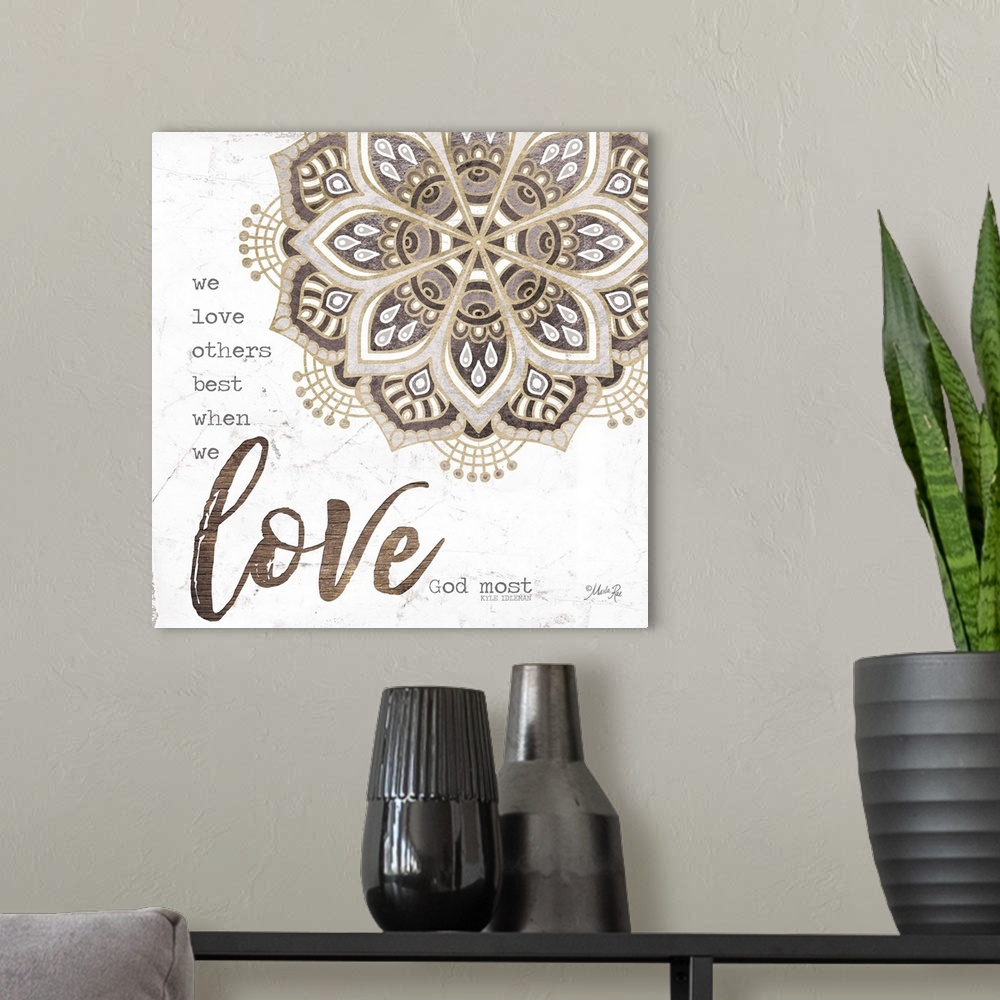 A modern room featuring Religious sentiment with the word "Love" in large script and a mandala design.