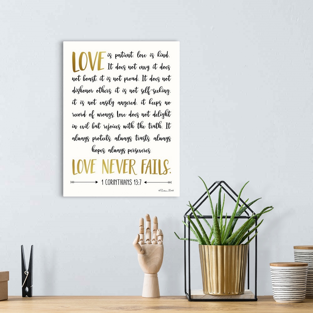A bohemian room featuring Bible verse 1 Corinthians 13:7 in black and gold script on white.